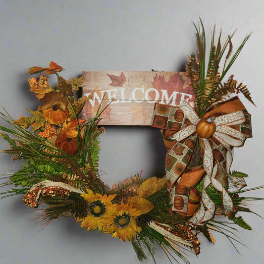 Autumn-themed  grapevine wreath with sunflowers and pumpkins